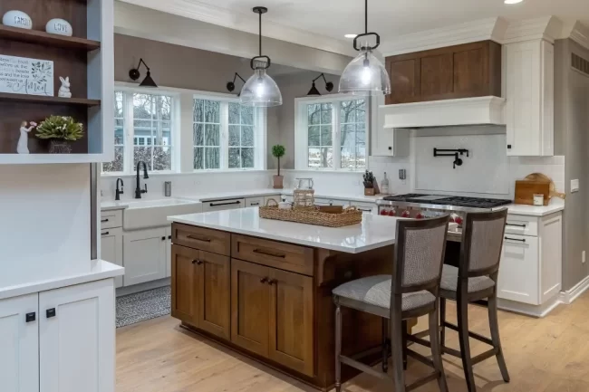 Gull Lake Kitchen with Island | Pennings & Sons White Kitchen with island and decorations