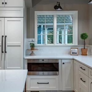 White Kitchen With Cabinet looking fridge doors