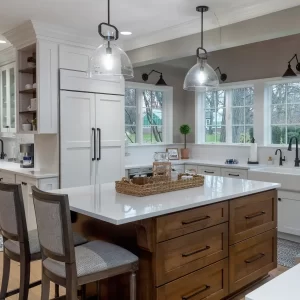 White Kitchen with island, hidden fridge, and side coffee bar