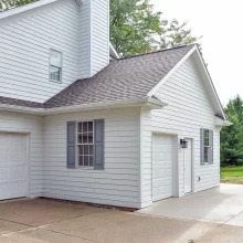 New garage addition extending out from the house