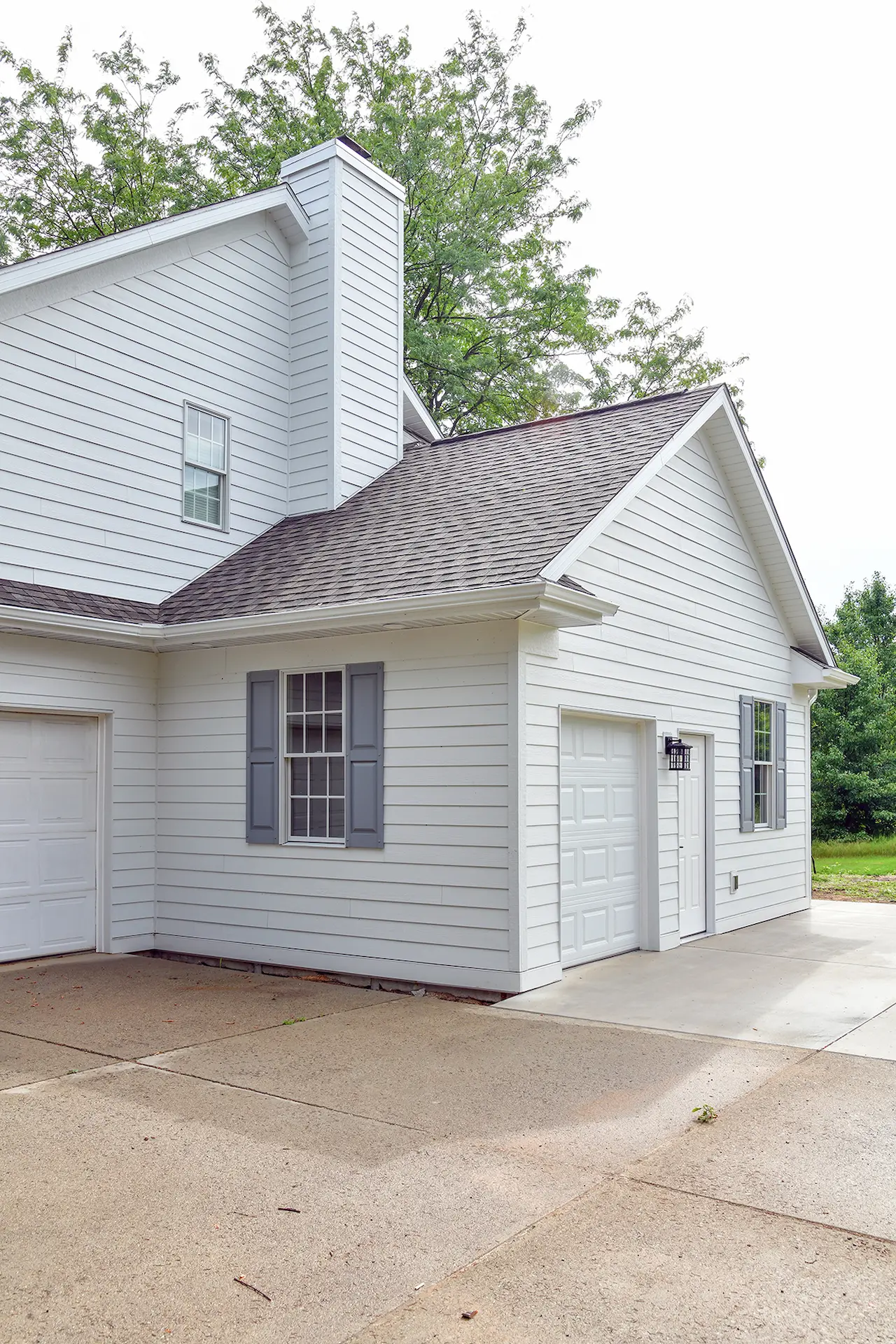 New garage addition extending out from the house